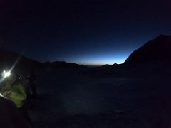 04A The first rays of daylight on the horizon at crampon point on the way to Ak-Sai Travel Lenin Peak Camp 2 5400m DCIM\100GOPRO\G0010156.JPG